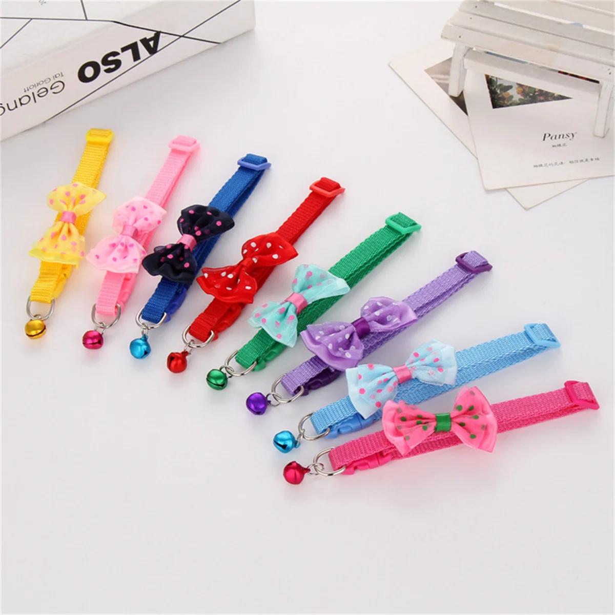 kf-S7ba7ce1ae5c34ff88f4eb02a175e3fa29-Collar-con-pajarita-ajustable-para-perro-bonito-Collar-con-campana-para-gatos-conejos-y-cachorros-suministros